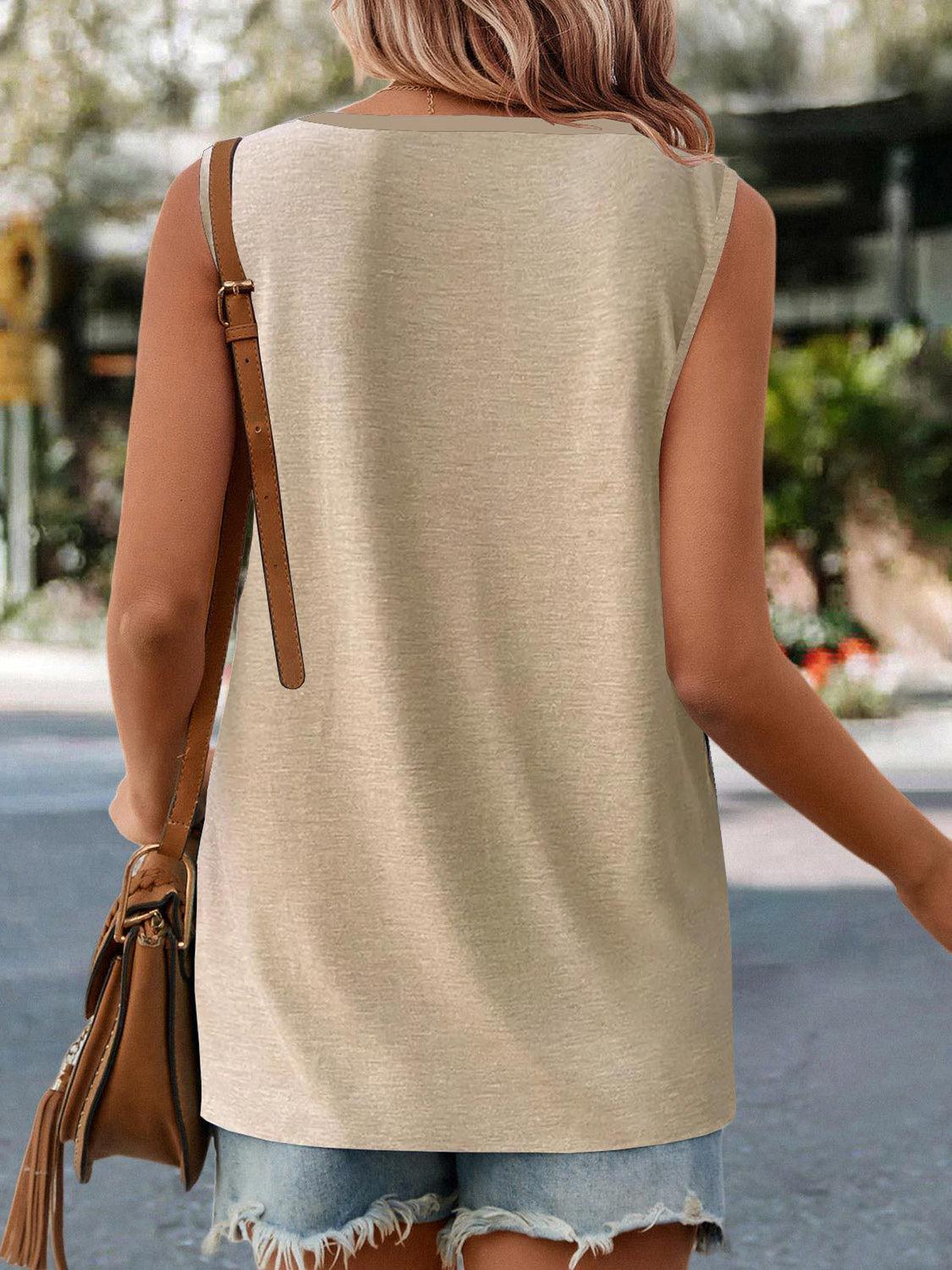 a woman walking down the street wearing a tan top