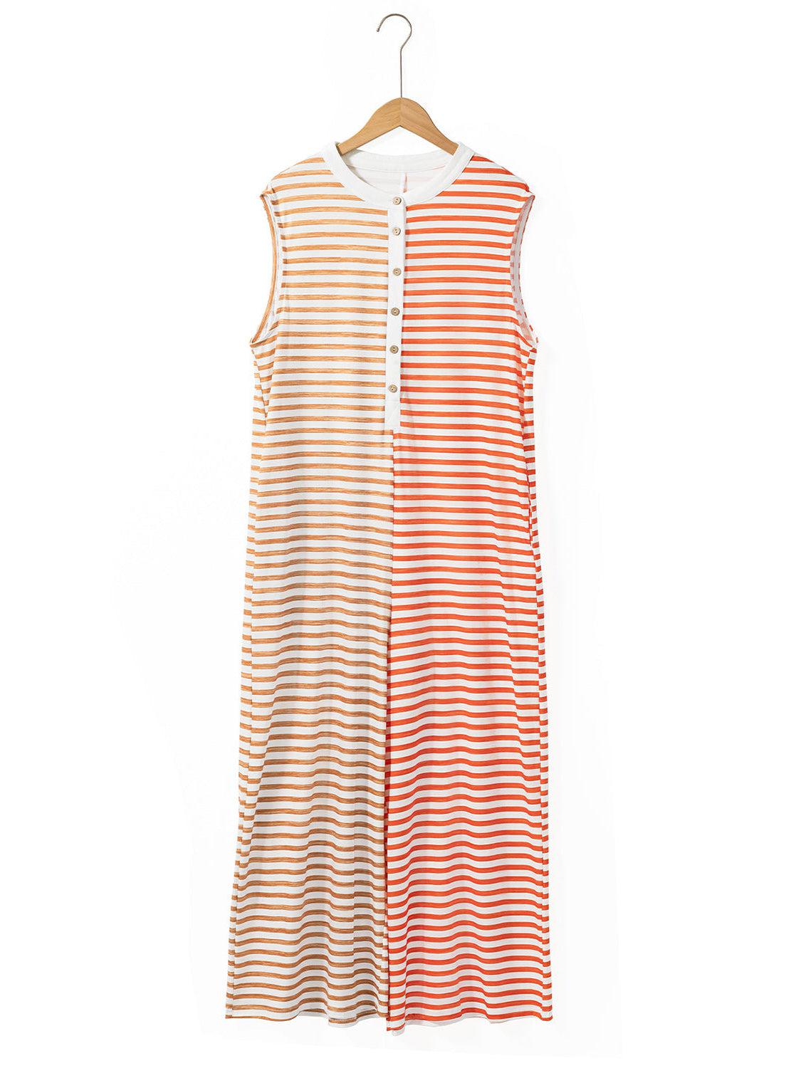 an orange and white striped dress hanging on a hanger