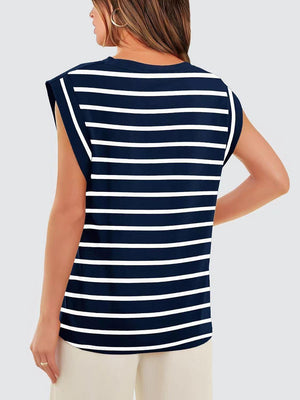 a woman wearing a navy and white striped top