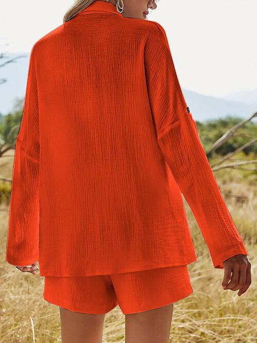 a woman standing in a field of tall grass