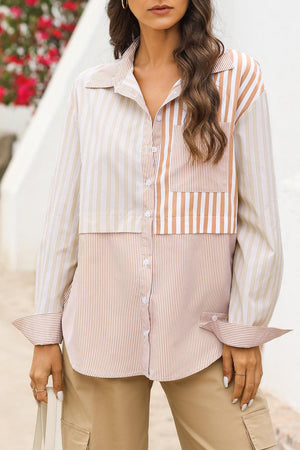 a woman wearing a striped shirt and tan pants