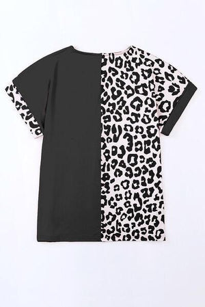 a black and white t - shirt with a leopard print