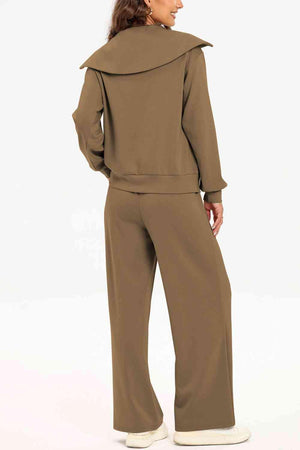 a woman wearing a brown jumpsuit and white shoes