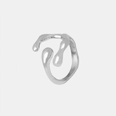 a silver ring on a white background