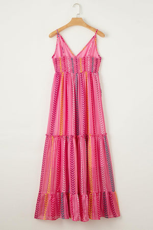 a pink dress hanging on a hanger