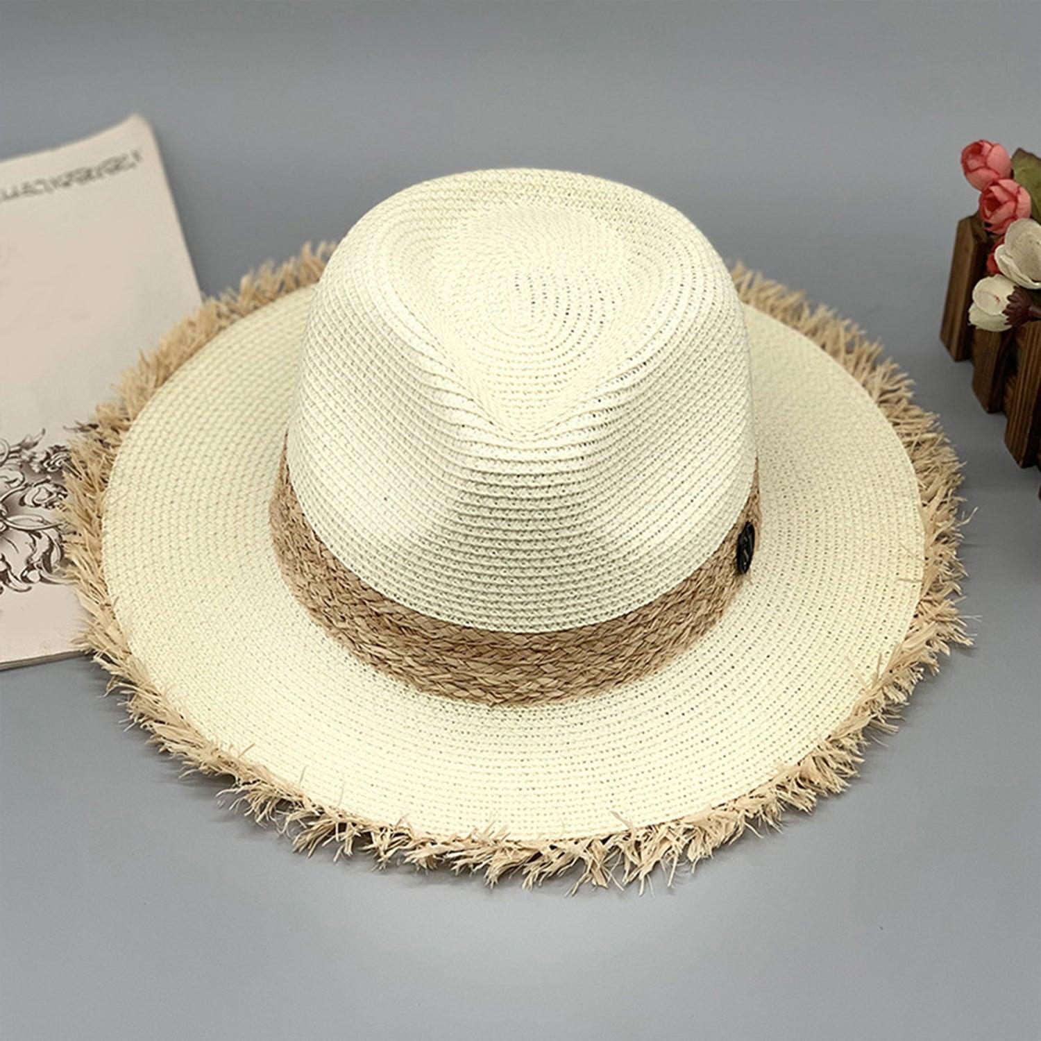 a white hat sitting on top of a table