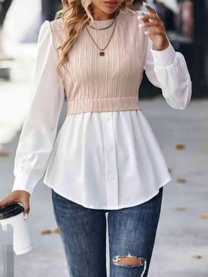 a woman walking down a street while holding a cell phone