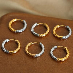 six pairs of gold and silver hoop earrings