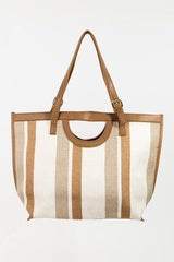 a brown and white striped bag hanging from a hook