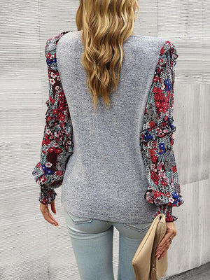 a woman in jeans and a sweater back view