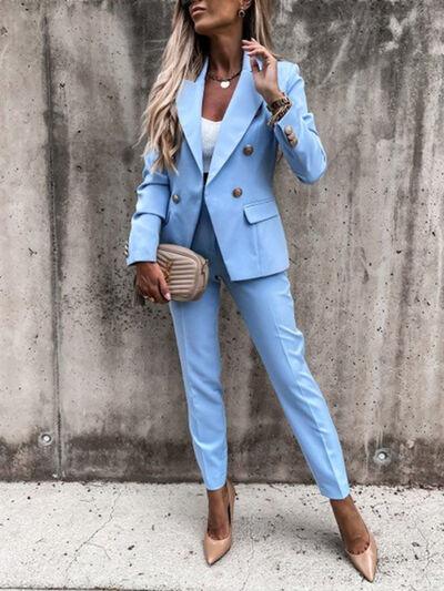 a woman wearing a blue suit and heels