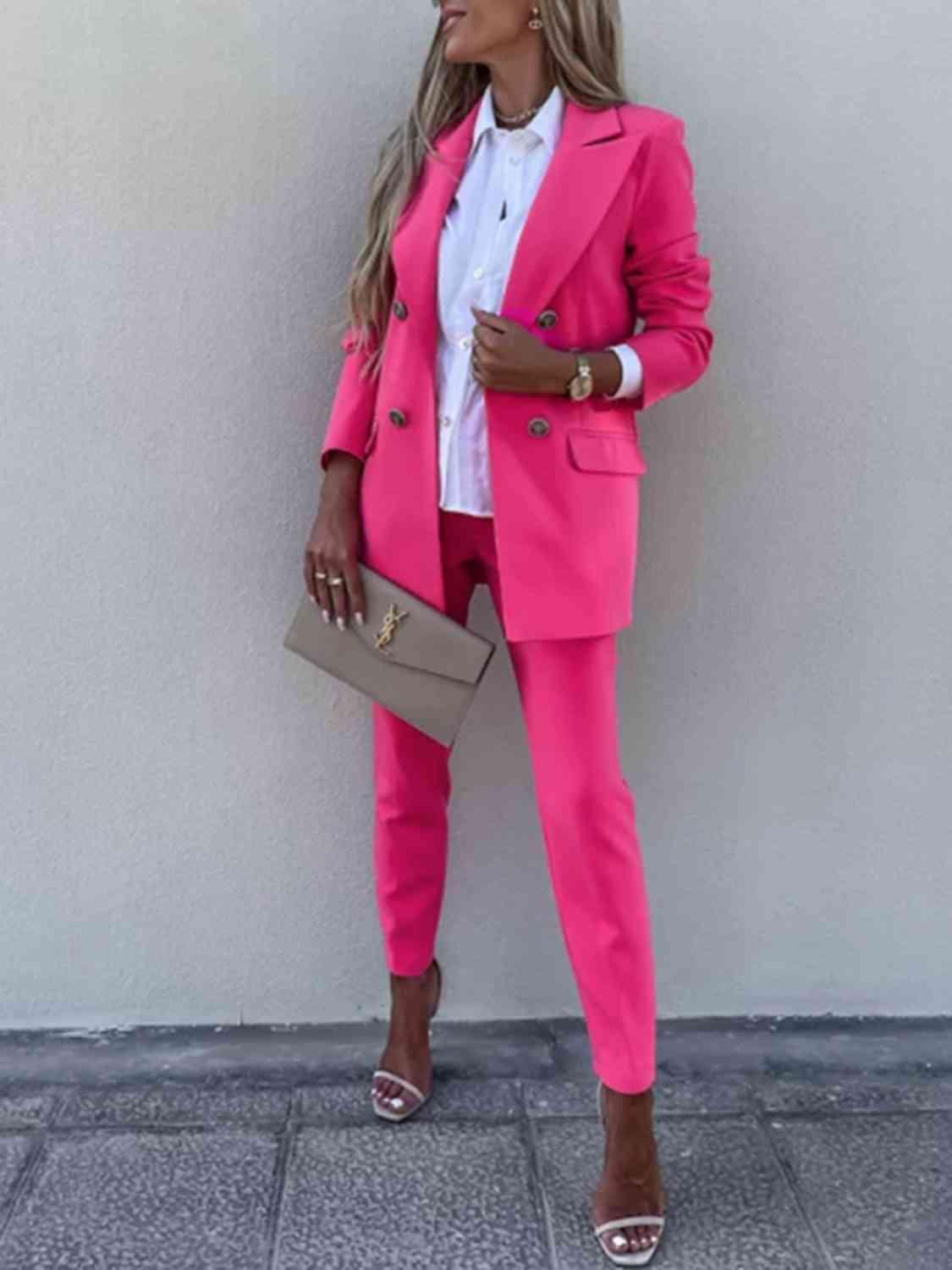 a woman wearing a pink suit and white shirt