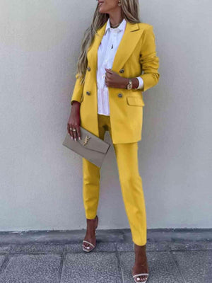 a woman wearing a yellow suit and white shirt