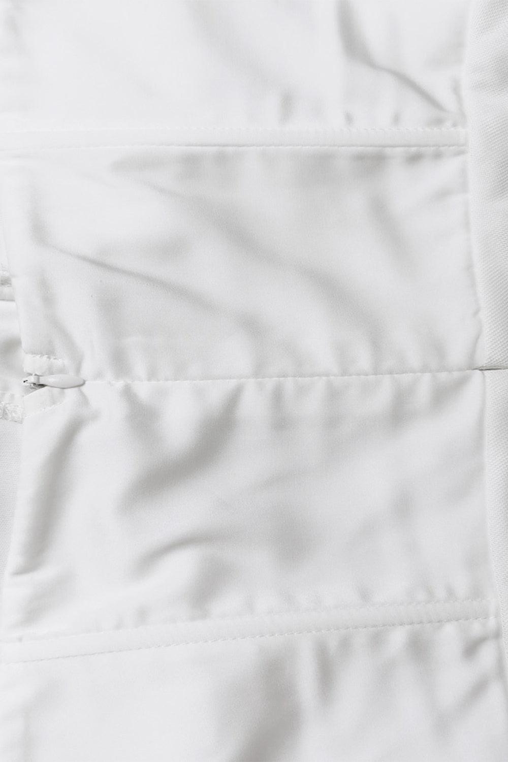 a close up of a pocket on a white shirt