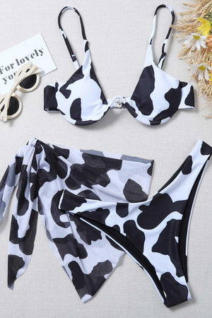 a bikini top with a cow print on it