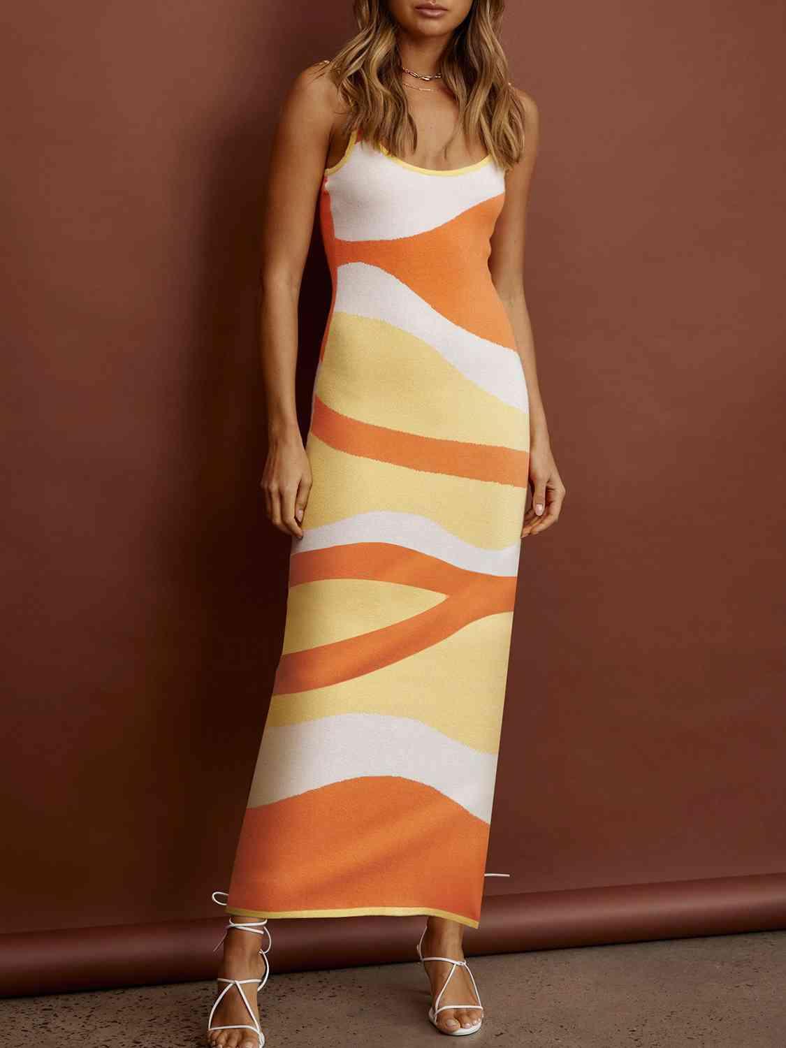 a woman in an orange and white striped dress