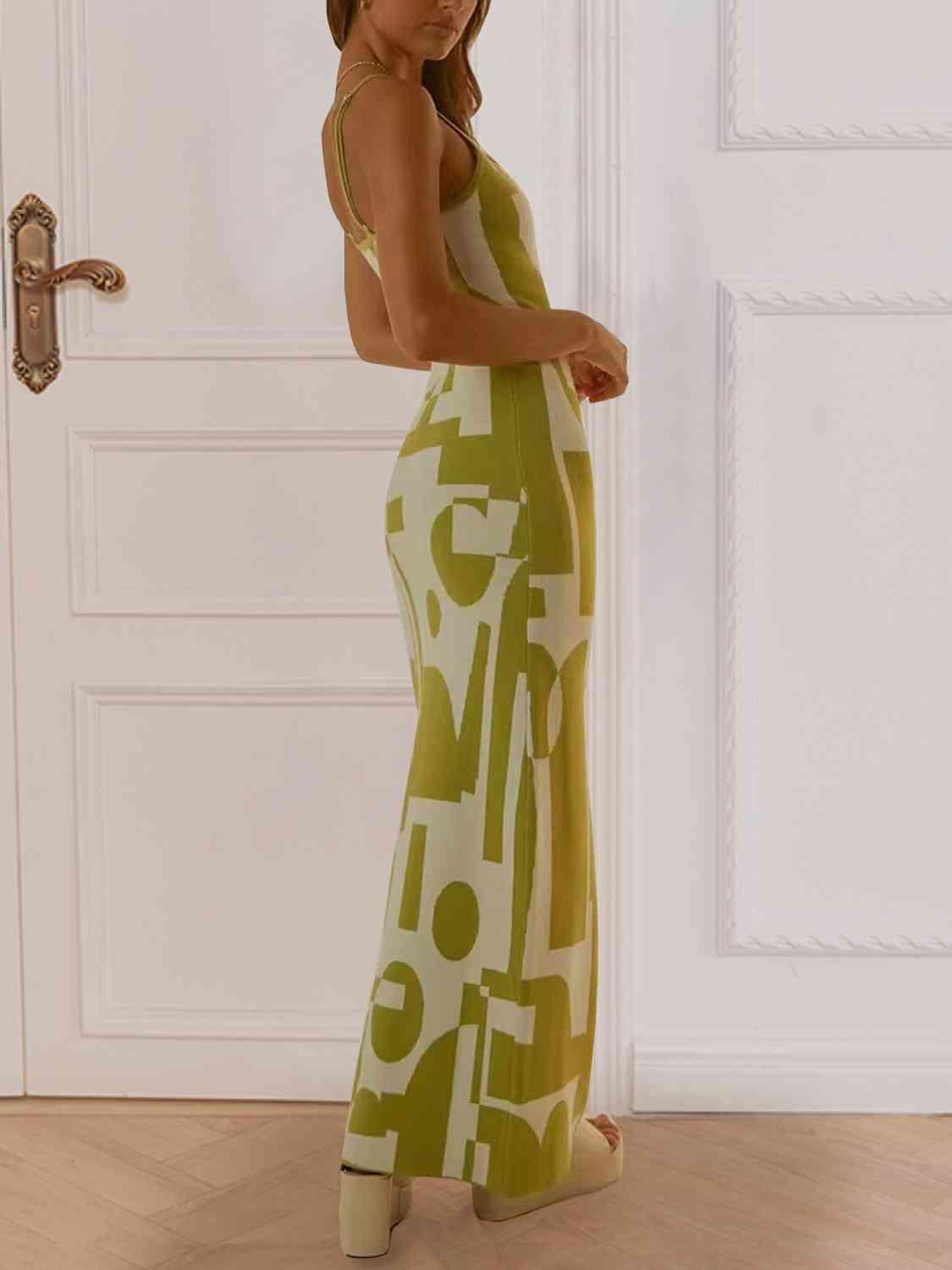 a woman standing in front of a door wearing a green and white dress