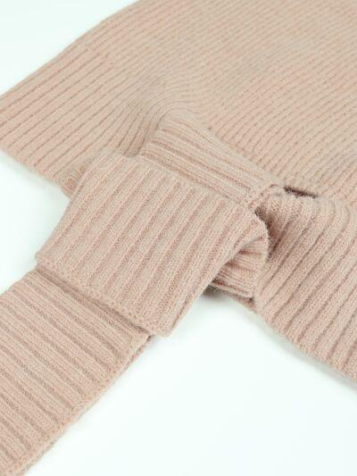 a close up of a sweater on a white background