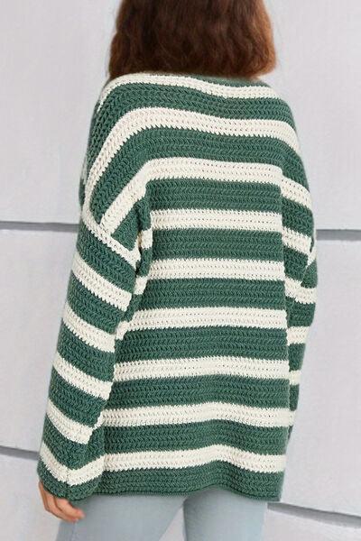a woman wearing a green and white striped sweater