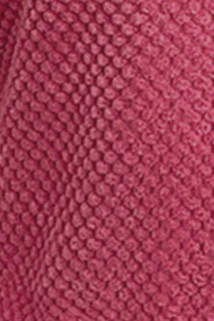 a close up of a pink knitted material