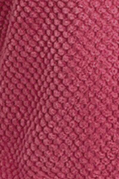a close up of a pink knitted material
