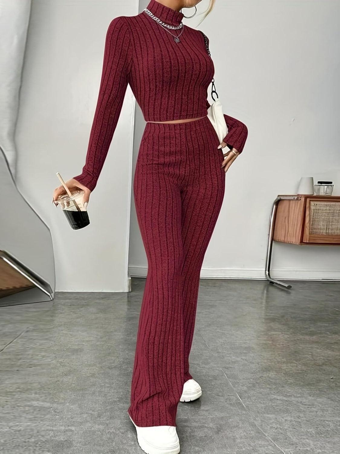 a woman in a red sweater and matching pants