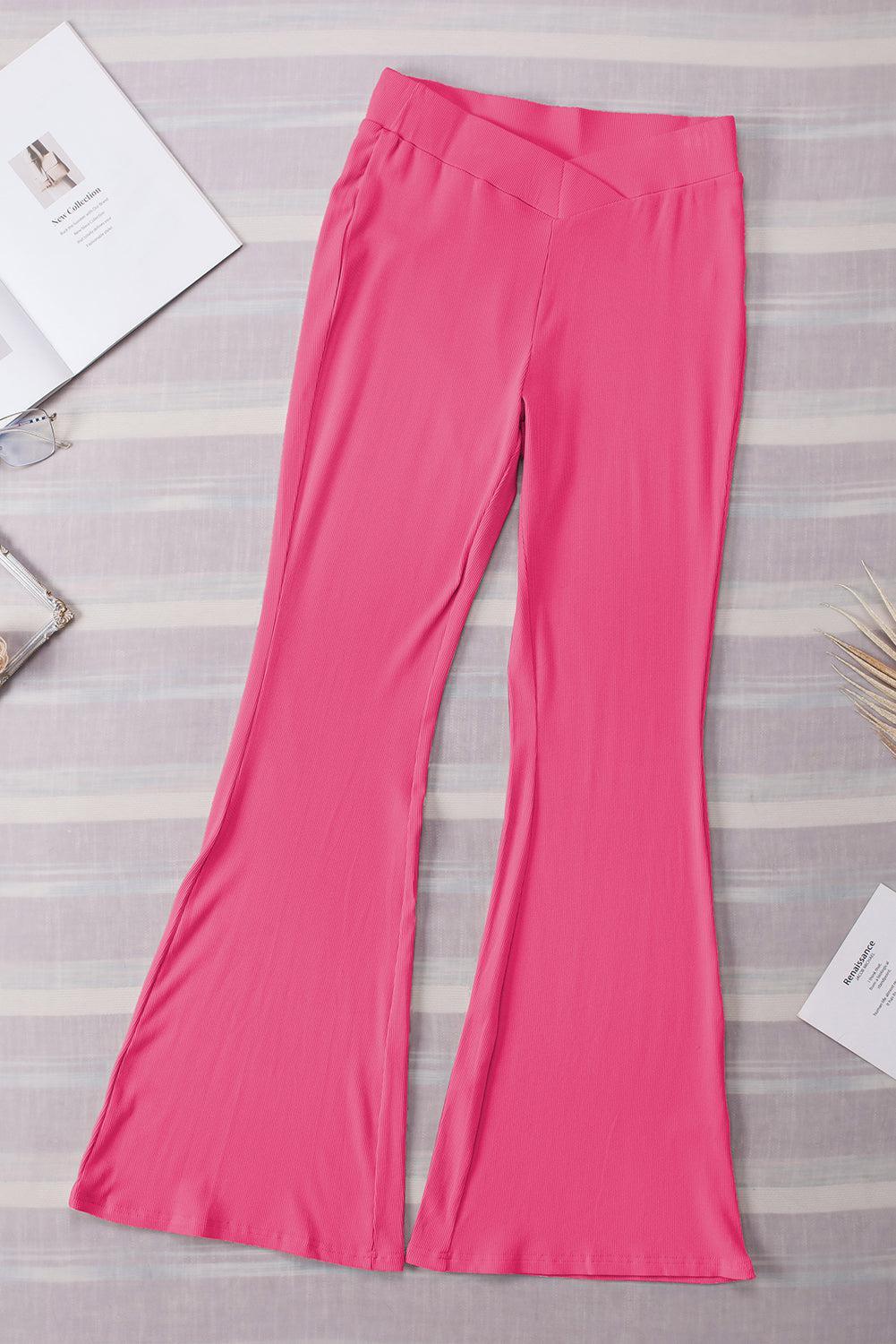 a pair of pink pants sitting on top of a table