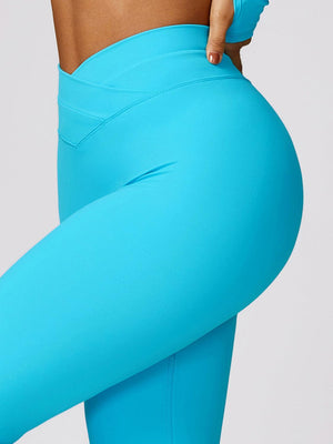 a close up of a woman's butt in a tight blue leggings