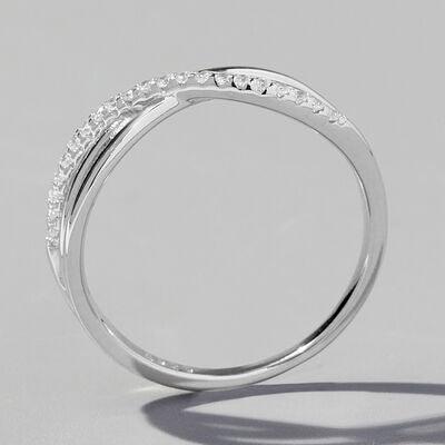 a white gold ring with three rows of diamonds