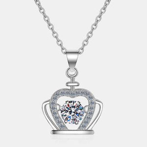 a necklace with a heart and a crown on it