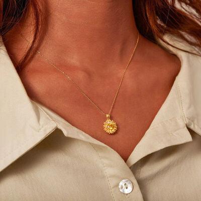 a close up of a woman wearing a necklace