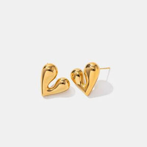 a pair of heart shaped earrings on a white background