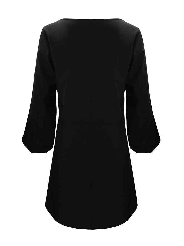 a women's black top with bell sleeves