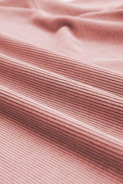 a close up of a pink textured fabric