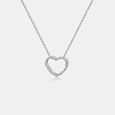 a heart shaped necklace on a chain