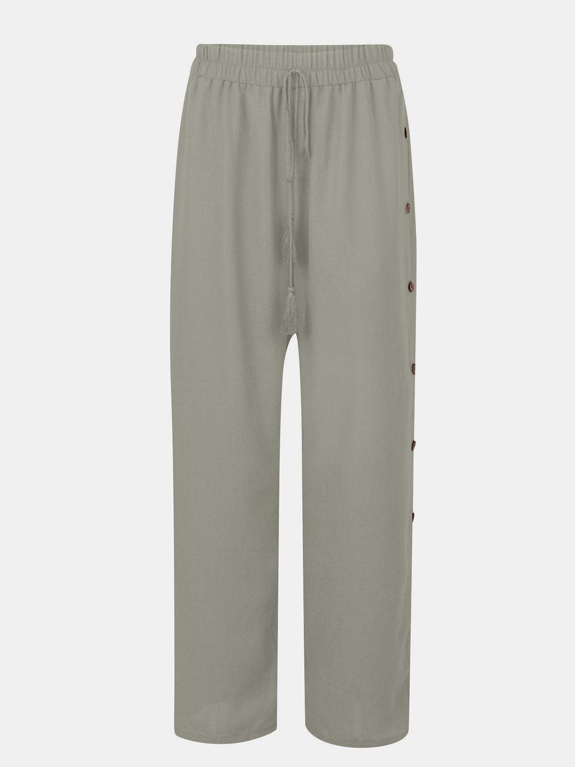a grey pants with buttons on the side