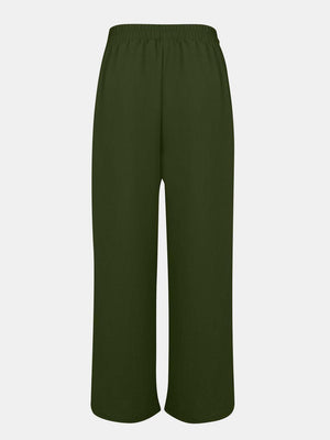 a women's green pants with a wide leg