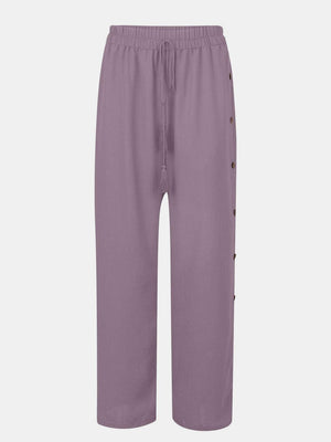 a purple pant with buttons on the side