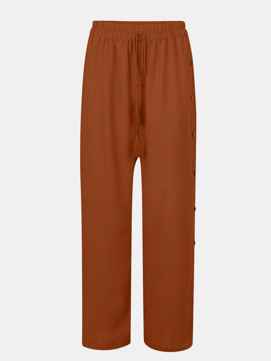 a brown pants with buttons on the side