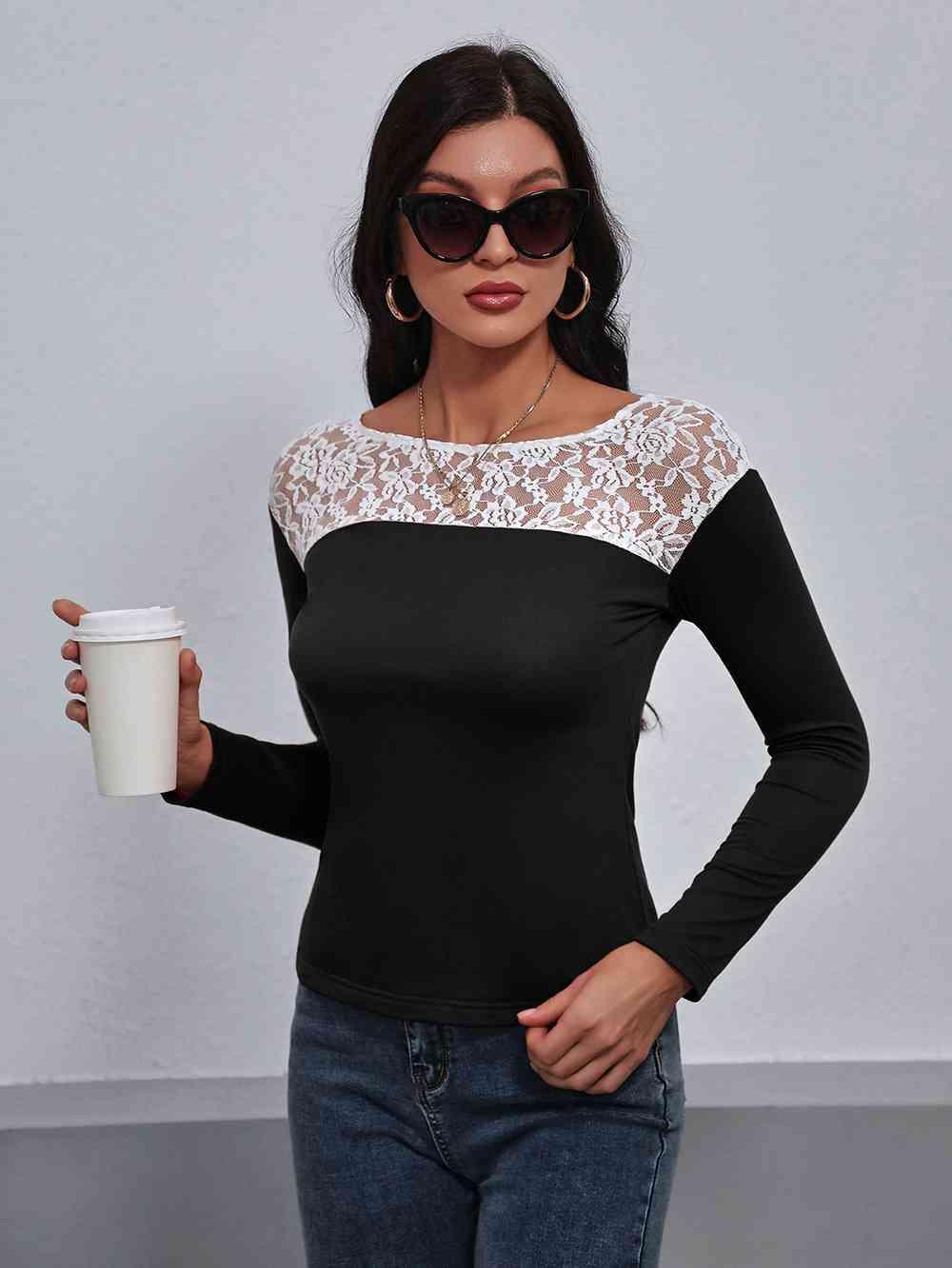 a woman holding a coffee cup and wearing sunglasses