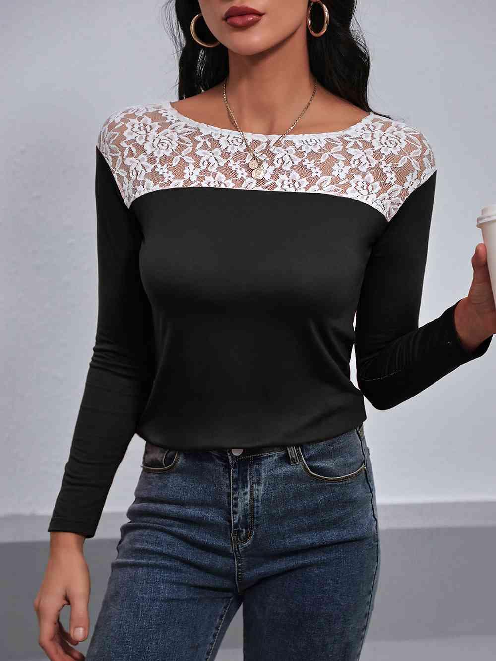 a woman wearing a black and white top