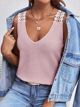 a woman wearing a pink top and denim jacket
