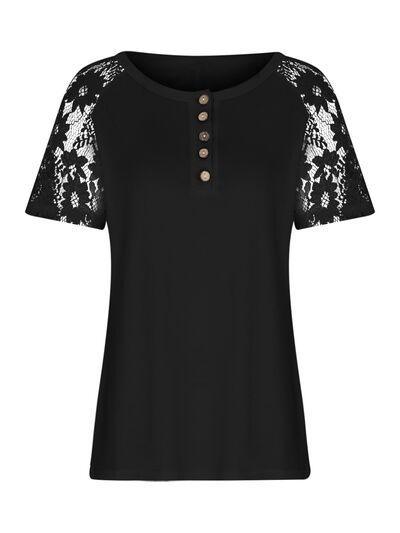 a black top with white lace sleeves