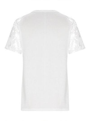 a white t - shirt with lace sleeves