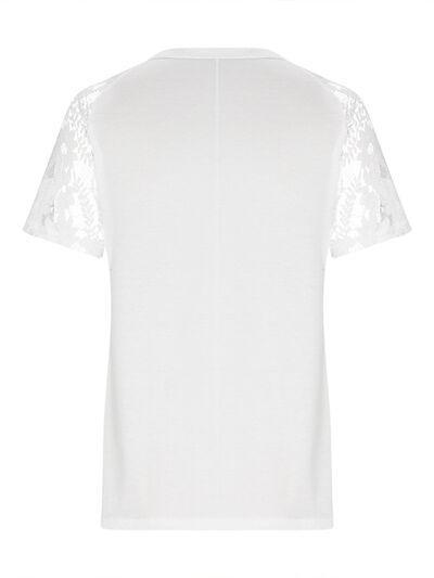 a white t - shirt with lace sleeves