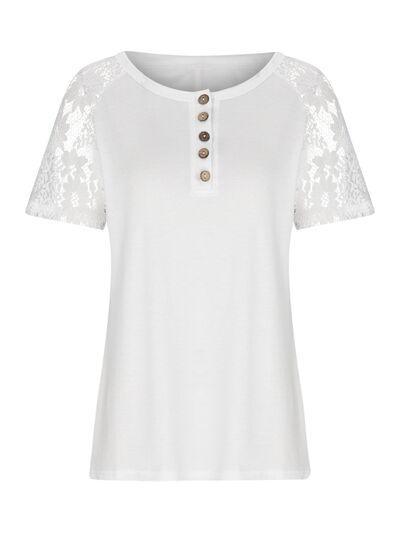 a white top with lace sleeves and buttons