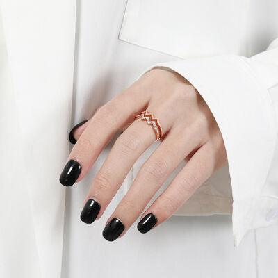 a woman's hand with a ring on it