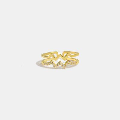 a gold ring with diamonds on it