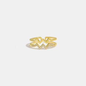 a gold ring with diamonds on it