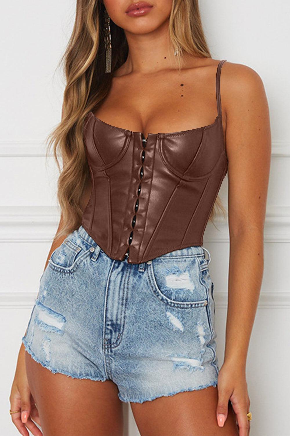 a woman wearing a brown leather corset